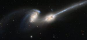 https://upload.wikimedia.org/wikipedia/commons/d/db/NGC4676.jpg